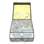 A vintage Ferrograph reel to reel recorder, in grey carry case, 45 by 44 by 25cm, together with