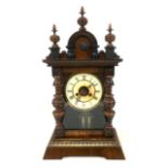 A German Junghans stained pine cased mantel clock, with eight day movement, 'No. 3037', mercury