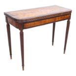 An early 19th century mahogany card table, of D form, the fold over surface with crossbanding, green