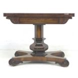 A 19th century rosewood card table, with circular olive green baize, raised upon a single baluster