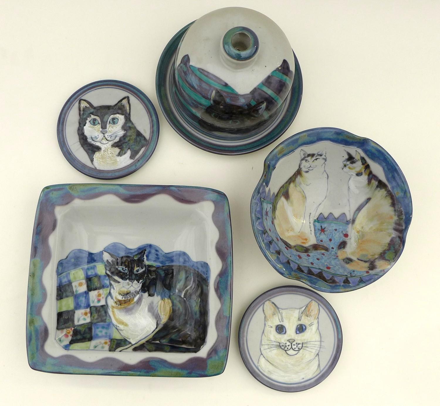 A group of Highland Stoneware pottery all depicting cats, comprising one medium bowl, one square