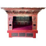 A Chinese wedding bed, Qing Dynasty, late 19th / early 20th century, with carved, painted, and