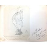 An Edwardian scrapbook with early to mid 20th century entries, including drawings and cartoons,