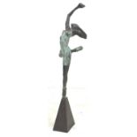 A modern bronzed metal sculpture, modelled as a ballet dancer in balanced pose, unsigned, on