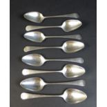 Eight George III silver old English pattern dessert spoons, with monogram possibly 'JMJ' to