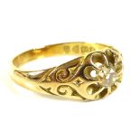 A 18ct yellow gold and diamond solitaire gentleman's gypsy ring, Victorian / Edward VII, with scroll