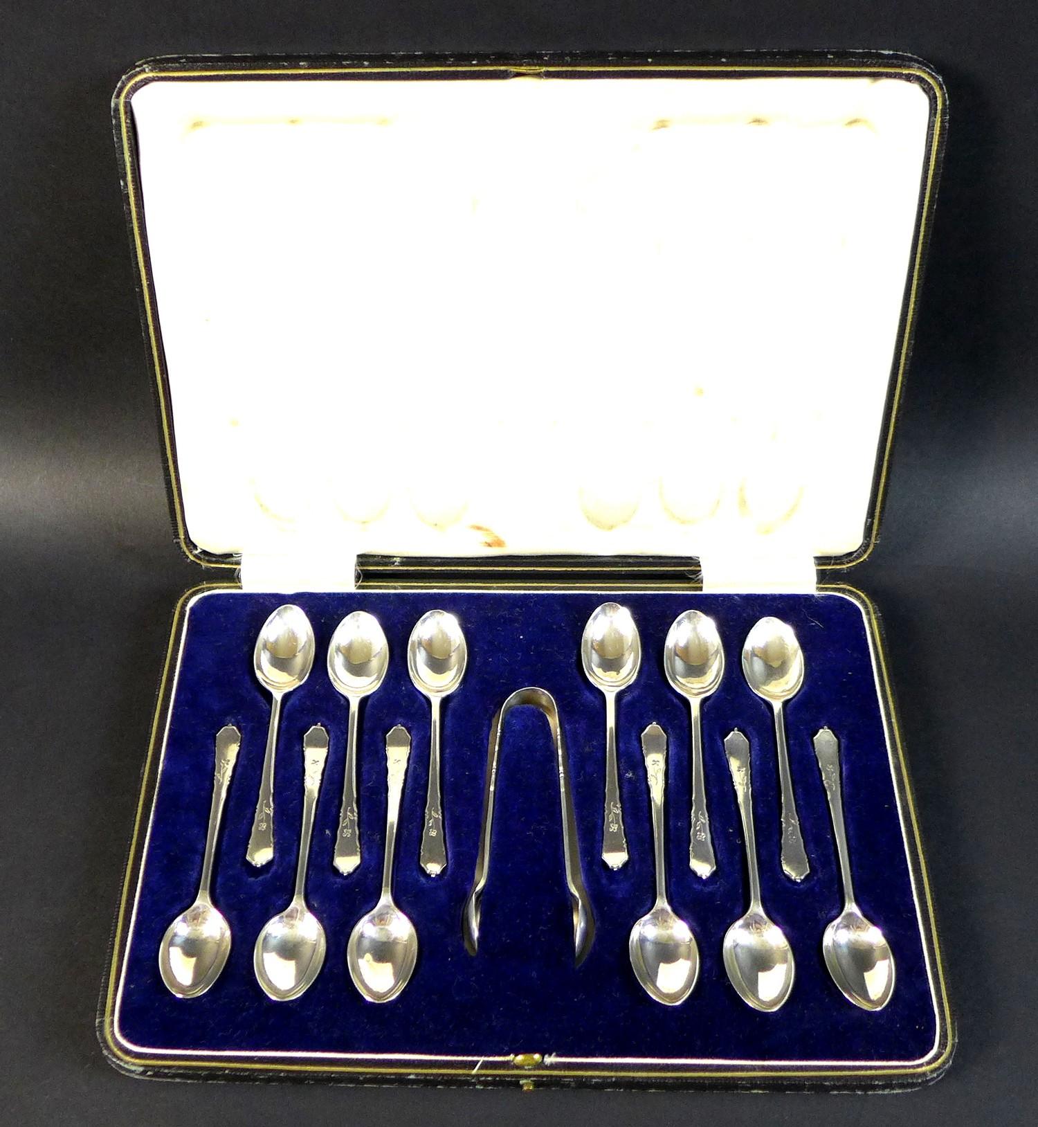 An Elizabeth II silver set of twelve teaspoons and pair of sugar nips, decorated with engraved - Image 3 of 6