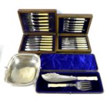 A group of silver plated wares, comprising a Victorian set of fish servers, with carved ivory