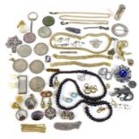 A collection of silver and costume jewellery, including a Victorian silver cased scent bottle,