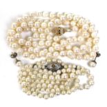 A string of pearls, pale pink lustred pearls of approximately 8 grain, with 14ct gold clasp,