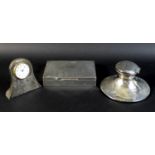 A group of three silver items, comprising a capstan inkwell, Stuart Clifford & Co., London 1912,