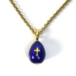 A Victor Mayer for Faberge enamel and 18ct gold egg pendant, the cobalt blue enamel with fleur de