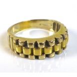 A yellow gold gentleman's ring, with modern sectional design, previously resized, marks rubbed but