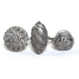 A group of three diamond dress rings, comprising a ring of ornate trefoil design, 20mm diameter,