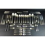 A canteen of Victorian and later silver flatware, comprising a collection of old English beaded