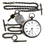 A silver cased Waltham pocket watch, together with two Albert chains, one with key and pendant