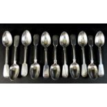 A collection of twelve Victorian fiddle pattern spoons, all with finials engraved with initial '