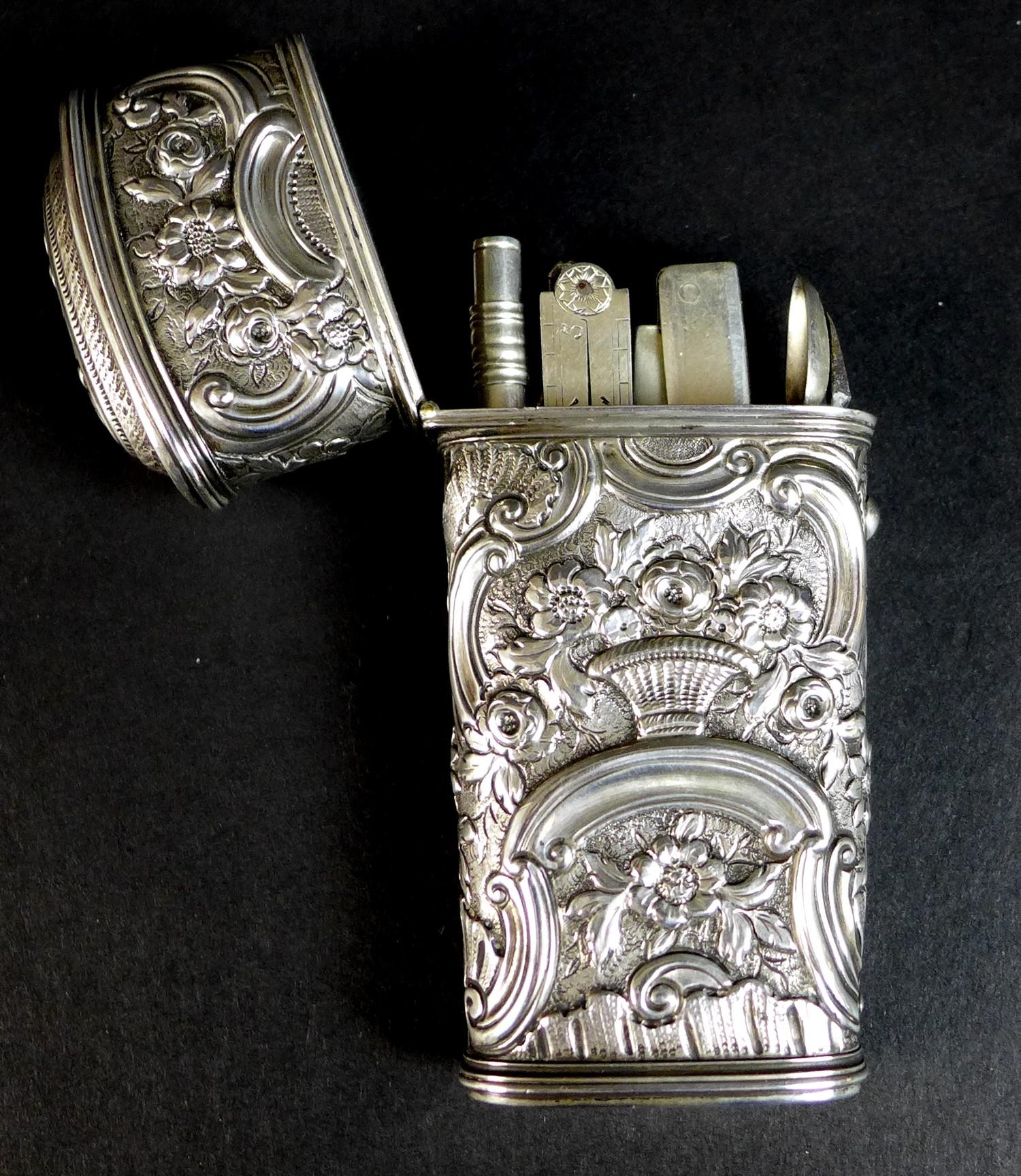 A late 18th or early 19th century silver coloured metal etui, of tapered rectangular form, chased - Image 3 of 11