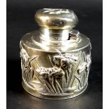 A Chinese silver inkwell of cylindrical form with irises surrounding, and butterfly to the lid,