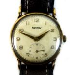 A 9ct gold cased Rotary wristwatch, with Arabic numerals to the champagne coloured dial and