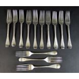 Thirteen various George III and later old English pattern silver table forks, four George III