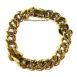 A 9ct gold kerb link bracelet, with safety chain attached and press clasp, links 12 by 4mm, FM,