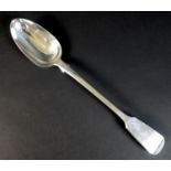 A Victorian silver fiddle pattern basting spoon, with monogram 'WSH' to its finial, Chawner & Co.,
