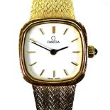 An Omega 9ct gold cased lady's wristwatch, model 7115598, circa 1990, the square white dial with