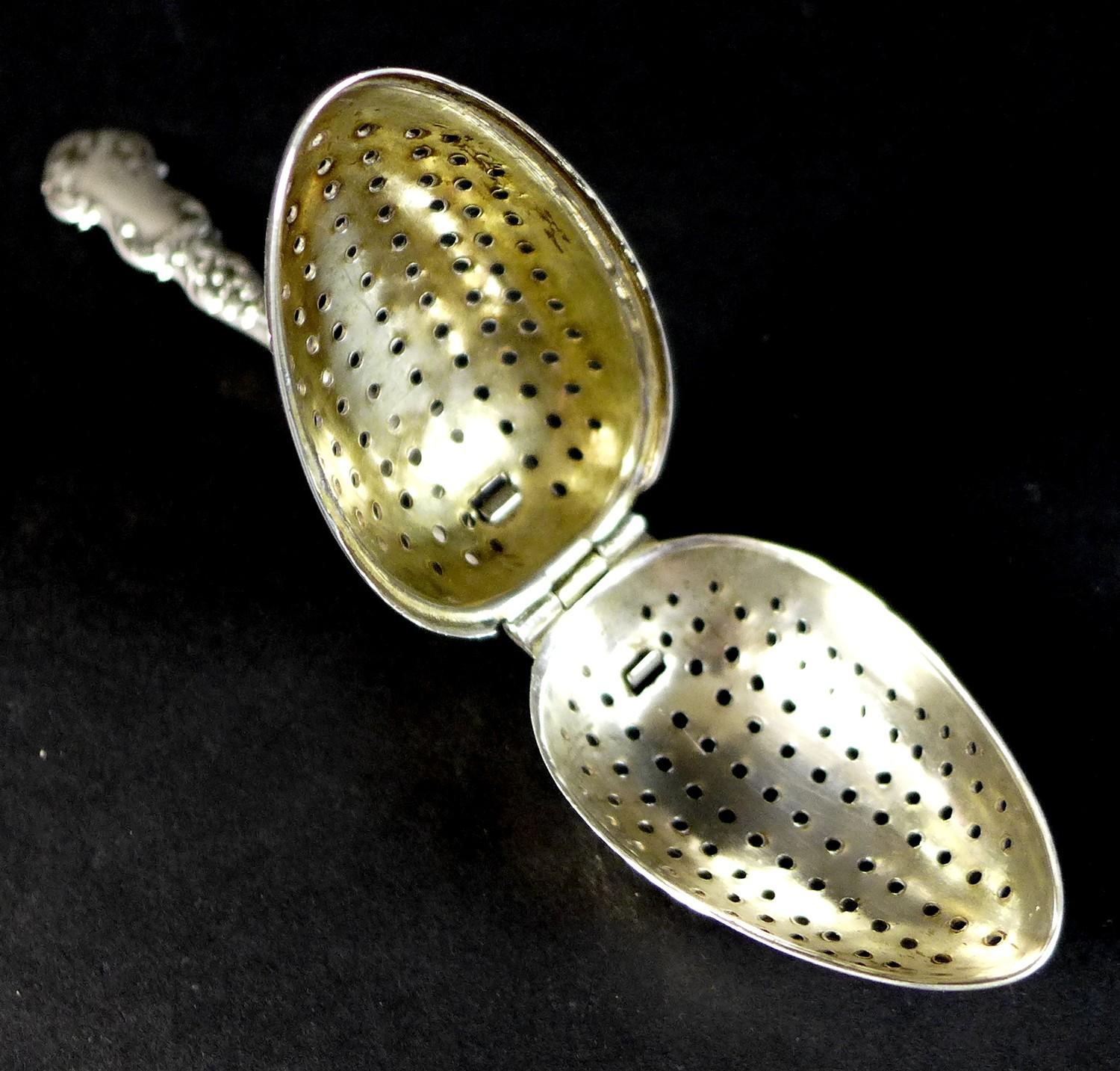 An Edward VII silver tea infuser, fancy scroll decorated handle with two pronged support to the - Image 4 of 6