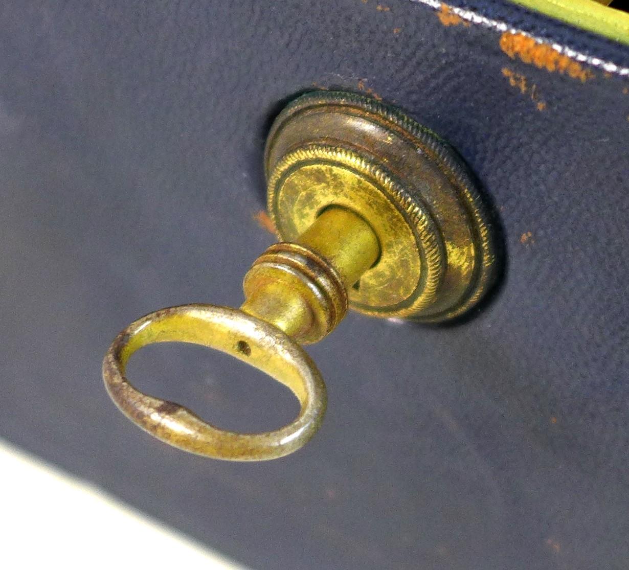 A late Victorian dark blue leather jewellery case, with gilt brass recessed handle with engraved - Image 5 of 11