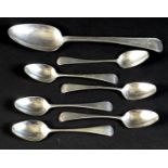 Seven pieces of George III Hanoverian pattern silver flatware, comprising a table spoon, 22cm