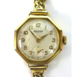 A Rotary 9ct gold lady's wristwatch, circa 1960, octagonal case, circular silvered dial with gold