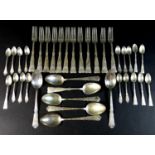 A collection of Danish silver flatware comprising twelve forks, 21cm long, a dessert spoon and six