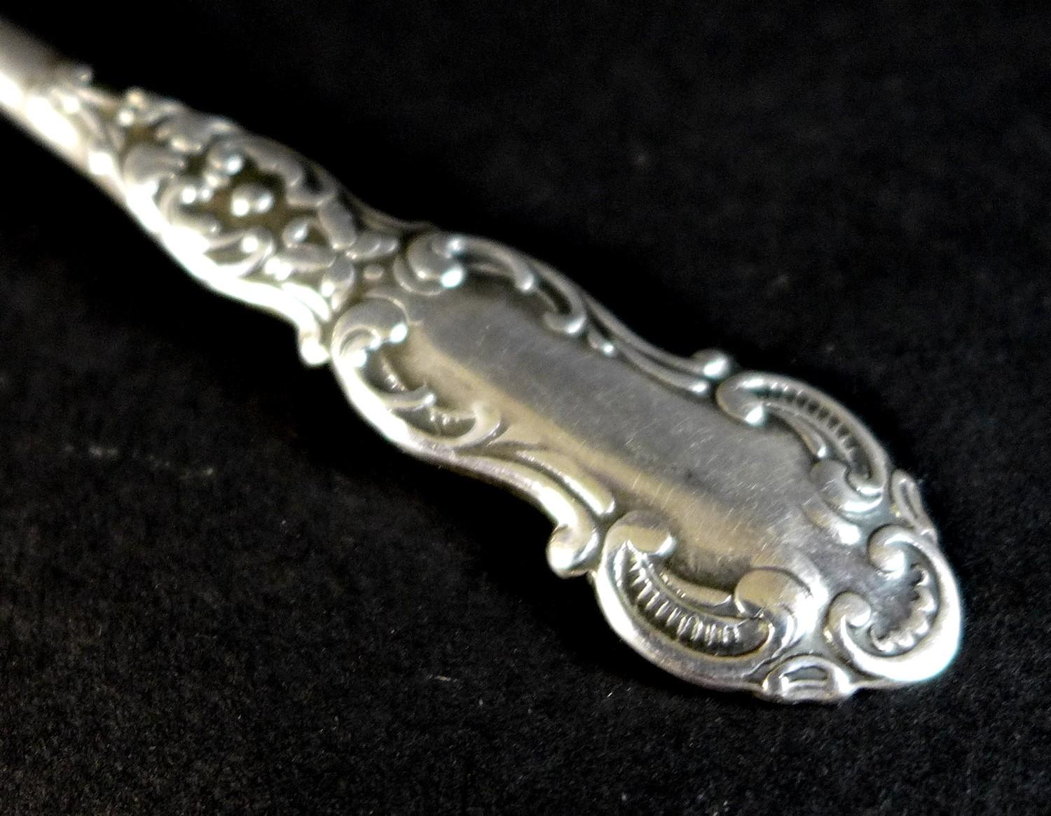 An Edward VII silver tea infuser, fancy scroll decorated handle with two pronged support to the - Image 2 of 6