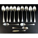 Thirteen pieces of George III and later silver flatware, comprising twelve old English pattern