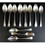 Eleven George III silver dessert spoons, comprising four spoons, Duncan Urquhart & Naphtali Hart,