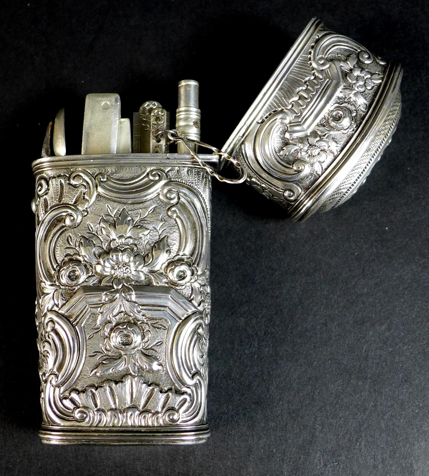 A late 18th or early 19th century silver coloured metal etui, of tapered rectangular form, chased - Image 5 of 11