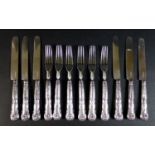 A set of twelve Regency silver desert knives and forks, with silver blades, a/f some loose,