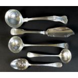 Five pieces of Victorian silver flatware, comprising three sauce ladles, one old English pattern,
