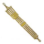 A late 18th century Continental gold plated fob chain, of fancy design with five rows of chain links