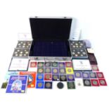 A collection of United Kingdom proof coin sets, including boxed 1983, 1984, 1985 and 1995,