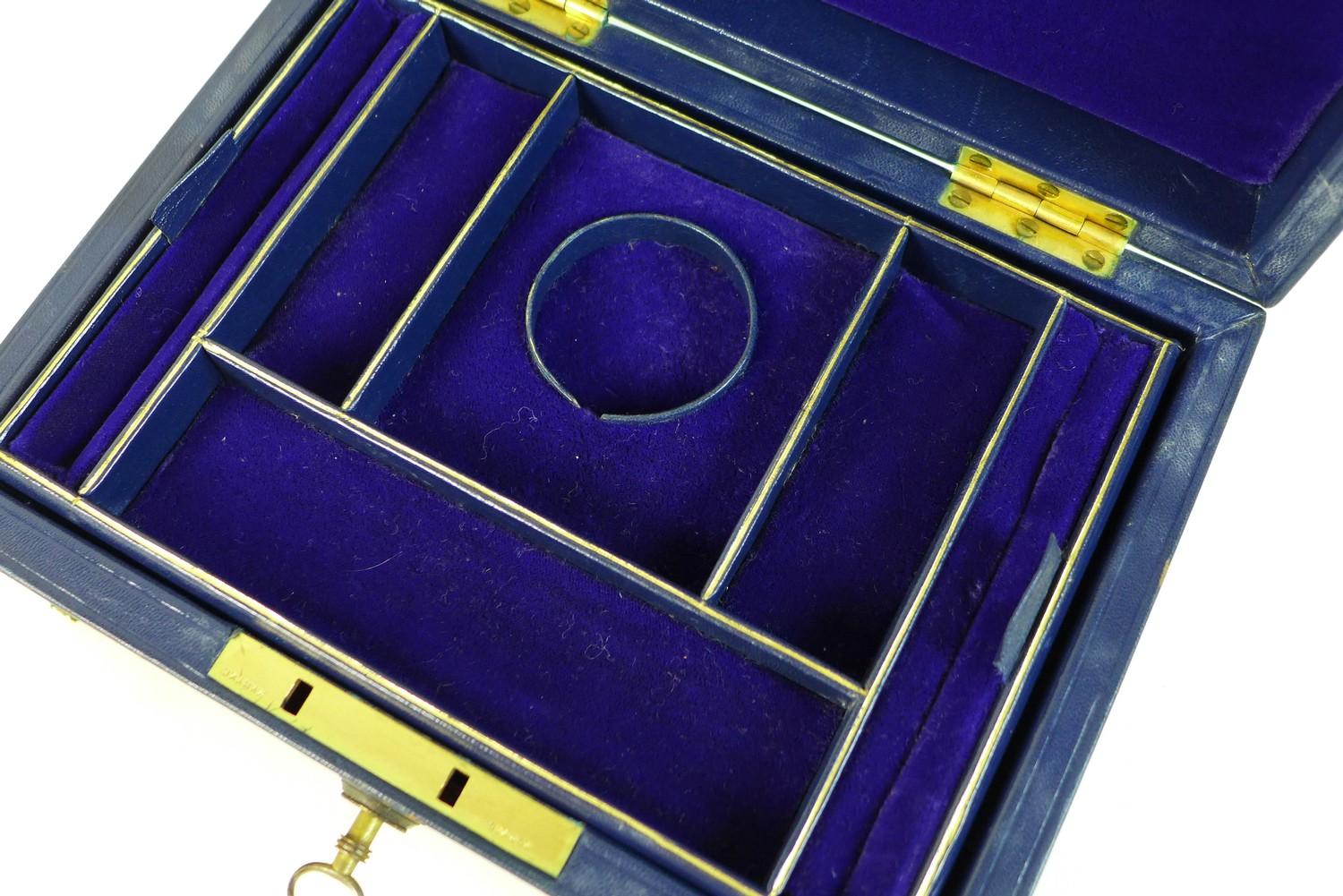 A late Victorian dark blue leather jewellery case, with gilt brass recessed handle with engraved - Image 2 of 11