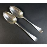 Two Georgian silver table spoons, comprising a George II silver table spoon, Old English pattern,