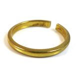 A 22ct gold wedding band ring, a/f cut, WWLd, London 1952, approximately size L when held