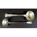 An early 20th century Tiffany & Co. silver sauce ladle, stamped 'PAT 1912 C', with engraved initials