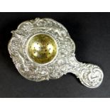 An 18th century Continental silver wine strainer, with crowned C mark possibly for Strasbourg