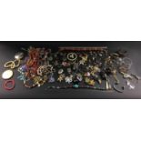 A large quantity of costume jewellery, including gilt metal necklaces, turquoise style necklaces,