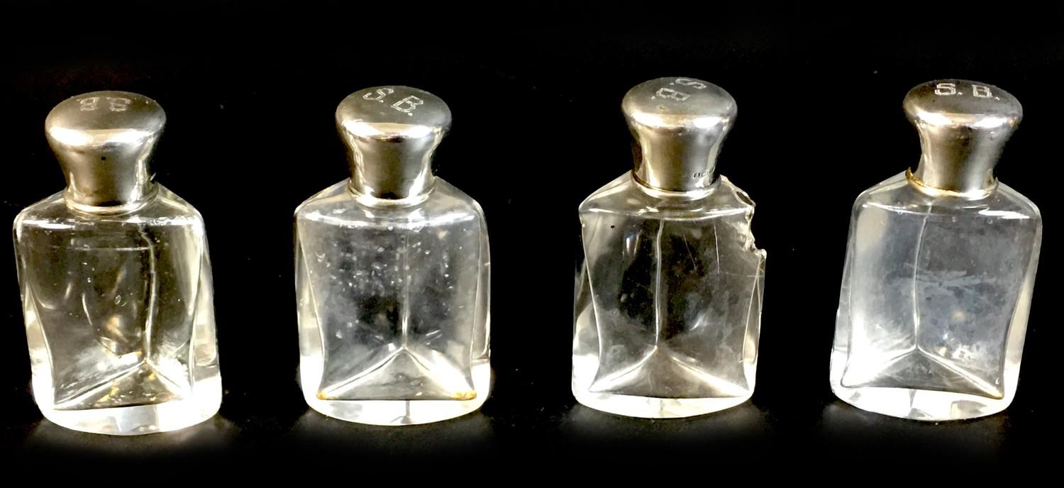 A cased set of four Edward VII silver topped dressing table bottles, monogram engraved 'S.B.', - Image 2 of 9