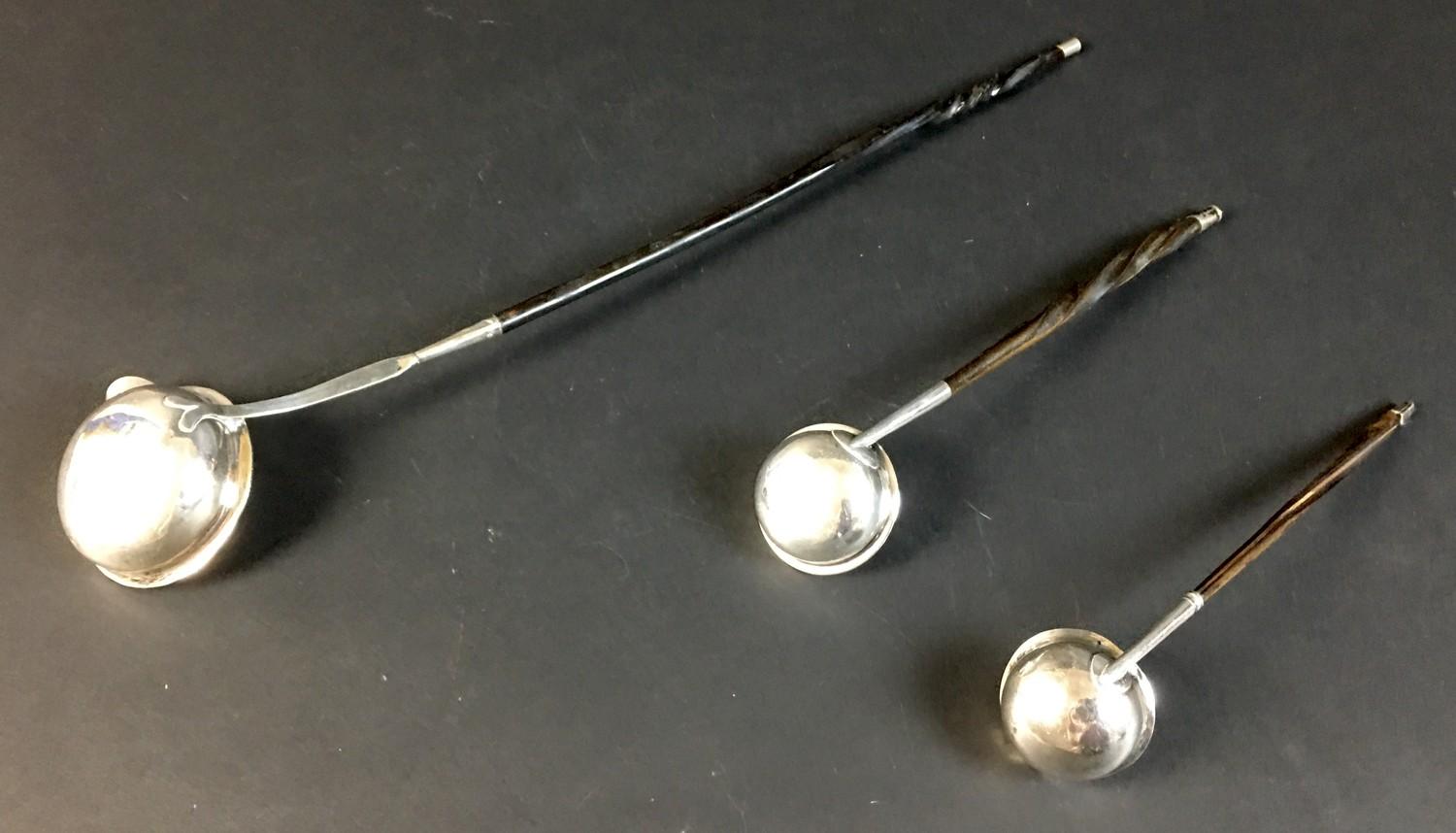 A William IV silver toddy ladle and two others, all with twisted whale bone handles, comprising a - Image 2 of 13