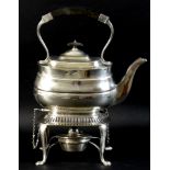 An Edward VII silver spirit kettle on stand, of London shape with ebonised bow shaped handle, side